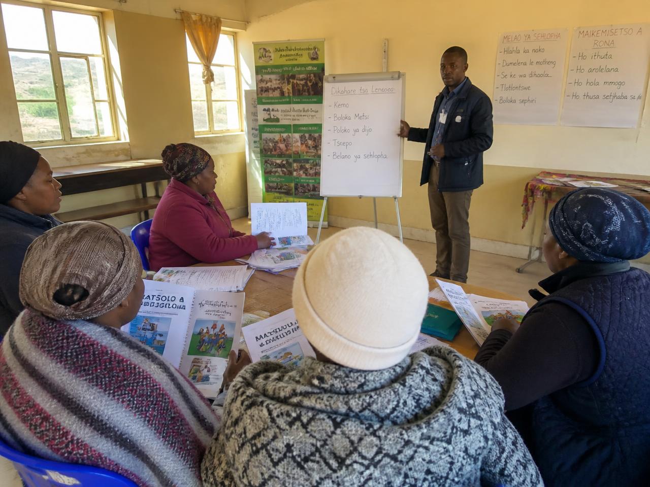 A facilitator leading a small-enterprise training session